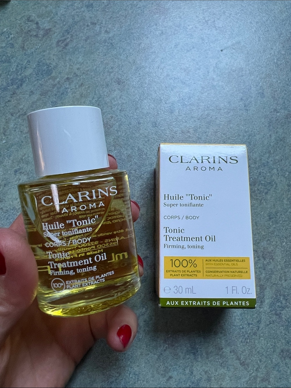 Clarins Tonic Treatment Oil - Yellow Bottle with White Cap